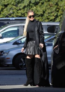 Khloe Kardashian in a Black Turtleneck