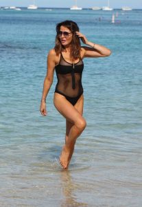 Lizzie Cundy in a Black Swimsuit