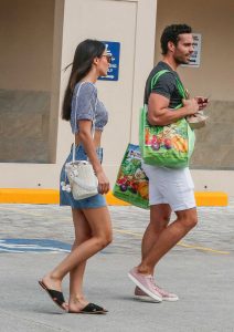 Lucy Watson in a Short Denim Skirt