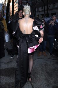 Rita Ora in a Black Cocktail Dress