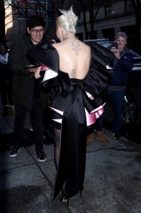 Rita Ora in a Black Cocktail Dress