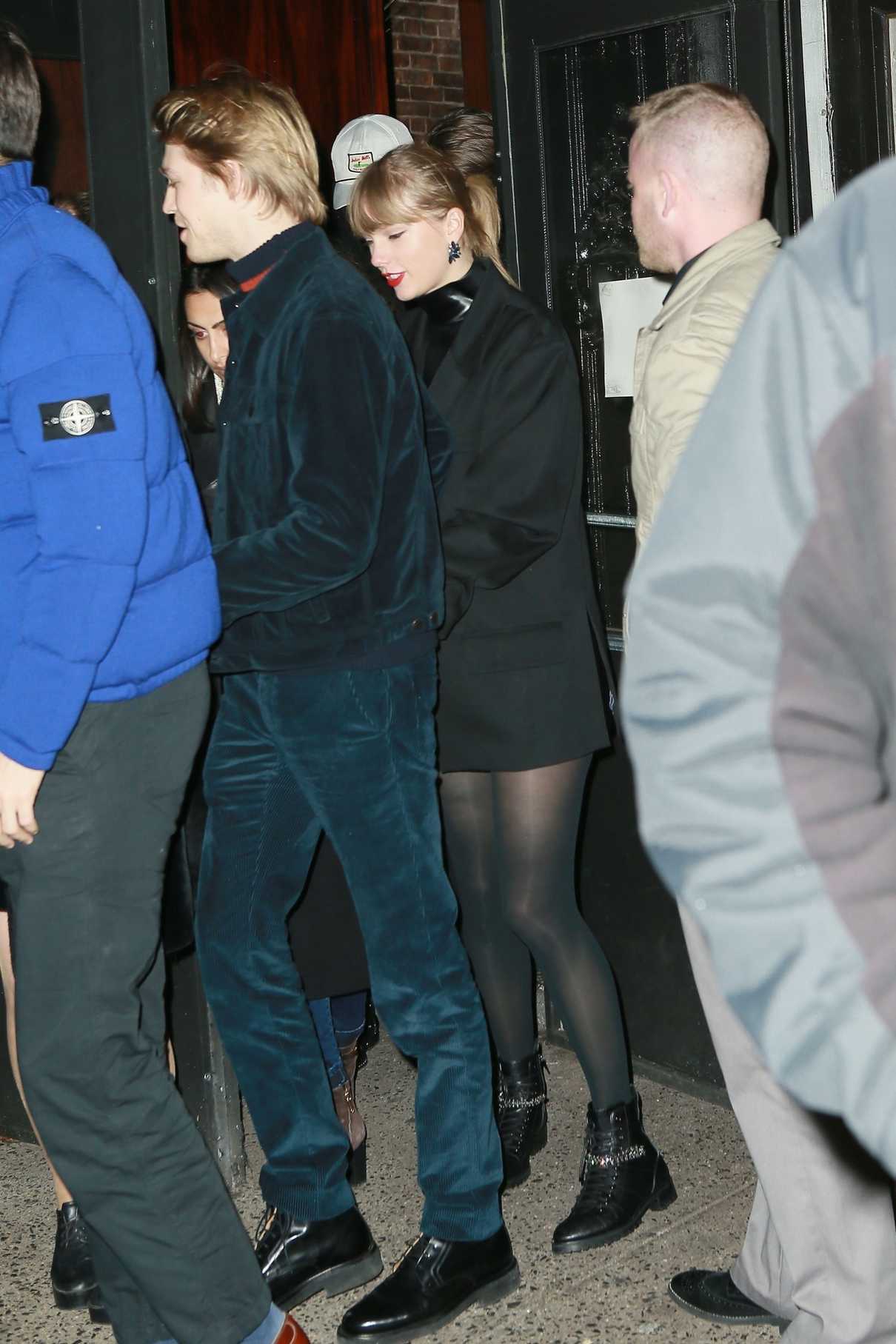 Taylor Swift in a Black Coat
