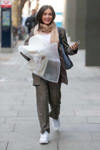 Amy Jackson in a Gray Suit