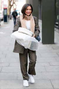 Amy Jackson in a Gray Suit