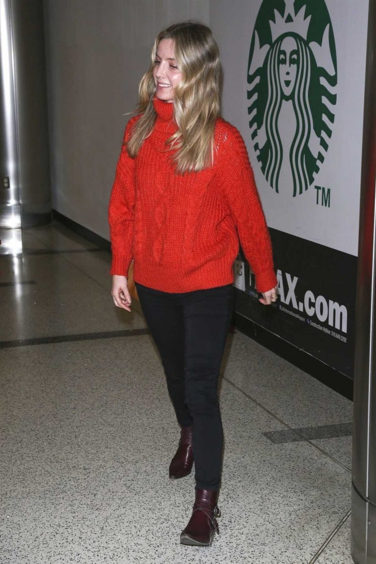 Annabelle Wallis in a Red Sweater Arrives at LAX Airport in Los Angeles