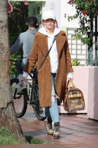Ashley Tisdale in a Beige Fur Coat