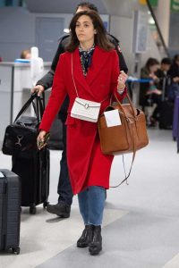 Emmy Rossum in a Red Coat