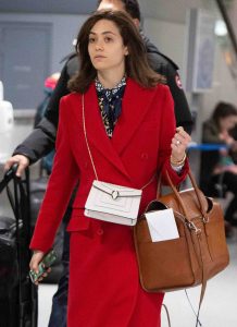 Emmy Rossum in a Red Coat