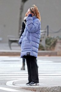 Gigi Hadid in a Pin Stripe Puffer Jacket