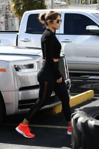 Jennifer Lopez in a Red Nike Sneakers