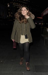 Kelly Brook in a Green Puffer Jacket