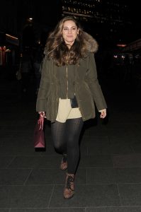 Kelly Brook in a Green Puffer Jacket