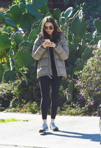 Lily Collins in a Gray Puffer Jacket