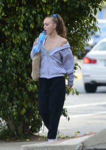 Lily-Rose Depp in a Gray Hoody