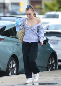 Lily-Rose Depp in a Gray Hoody