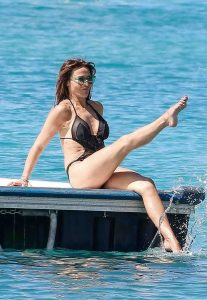 Lizzie Cundy in a Black Swimsuit