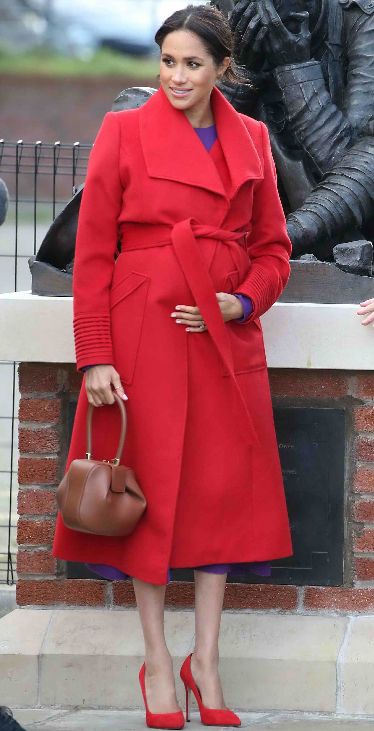 Meghan Markle in a Red Coat