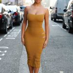 Demi Rose in a Yellow Form Fitting Dress Was Seen Out in London 02/15/2019