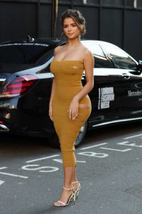 Demi Rose in a Yellow Form Fitting Dress