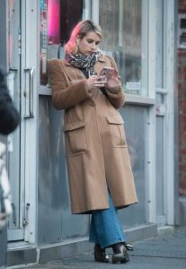 Emma Roberts in a Beige Coat