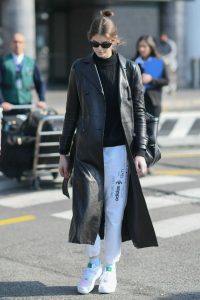 Kaia Gerber in a Black Leather Trench Coat