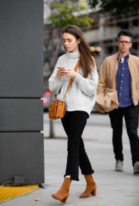 Lily Collins in a Gray Sweater