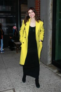 Alexandra Daddario in a Yellow Coat