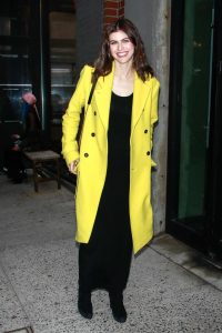 Alexandra Daddario in a Yellow Coat