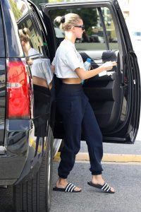 Hailey Baldwin in a Wite Cropped T-Shirt