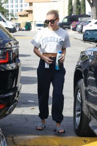 Hailey Baldwin in a Wite Cropped T-Shirt