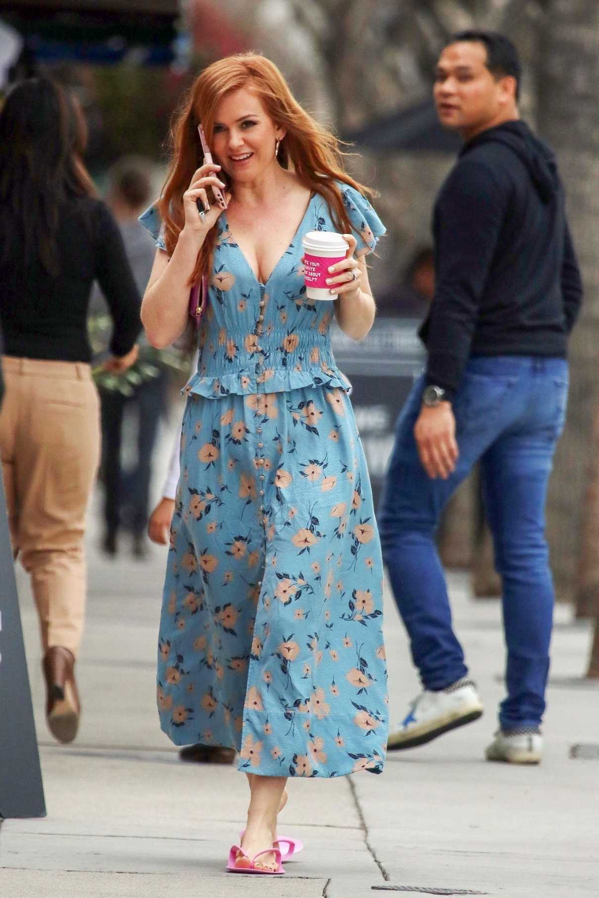 Isla Fisher in a Blue Floral Dress