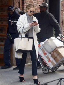 Jennifer Lawrence in a White Coat