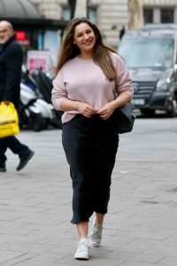 Kelly Brook in a Pink Sweater