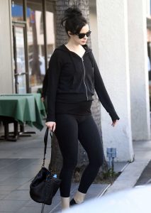 Krysten Ritter in a Black Leggings