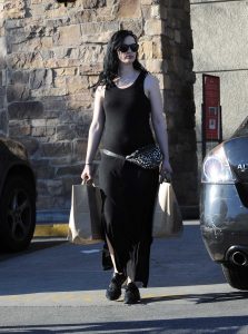 Krysten Ritter in a Long Black Dress