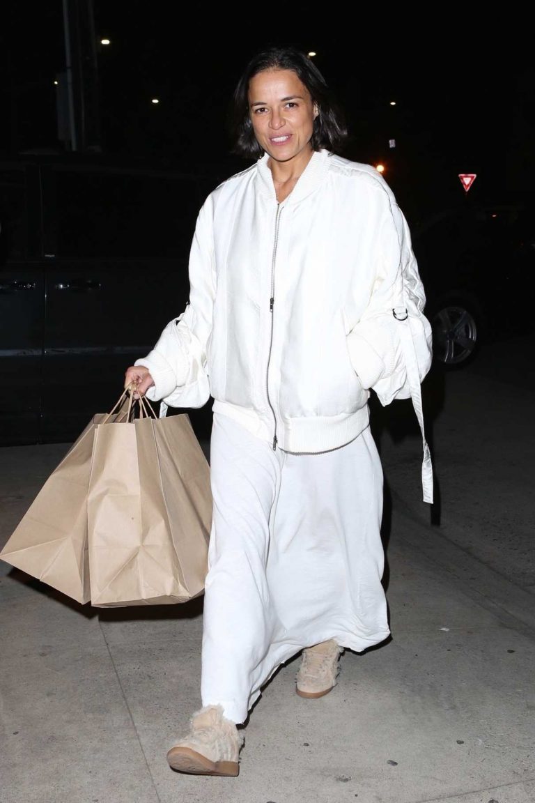 Michelle Rodriguez in a White Jacket Picks up Dinner at Giorgio Baldi