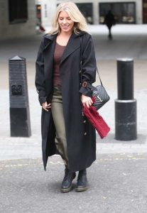 Mollie King in a Black Trench Coat
