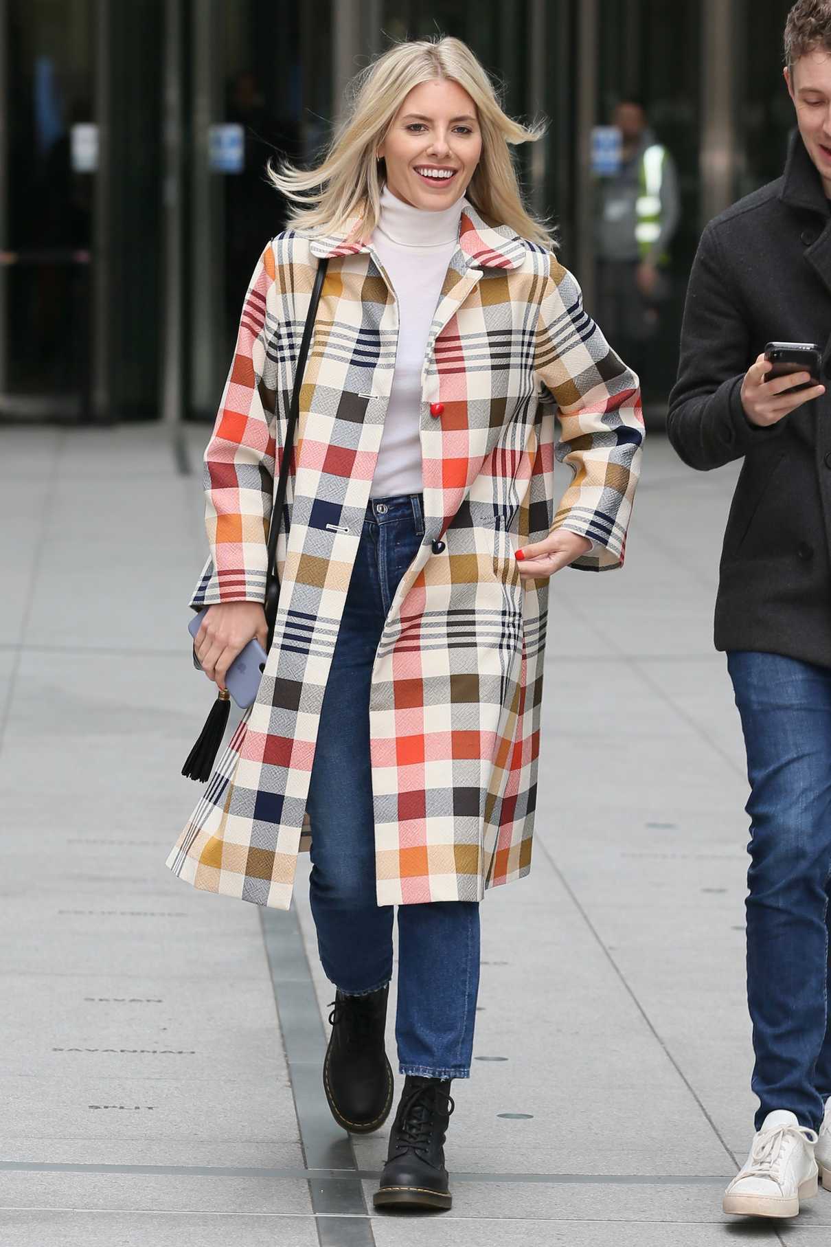 Mollie King in a Plaid Trench Coat