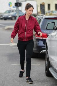 Amanda Crew in a Red Bomber Jacket