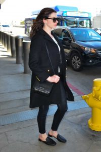 Anne Hathaway in a Black Coat