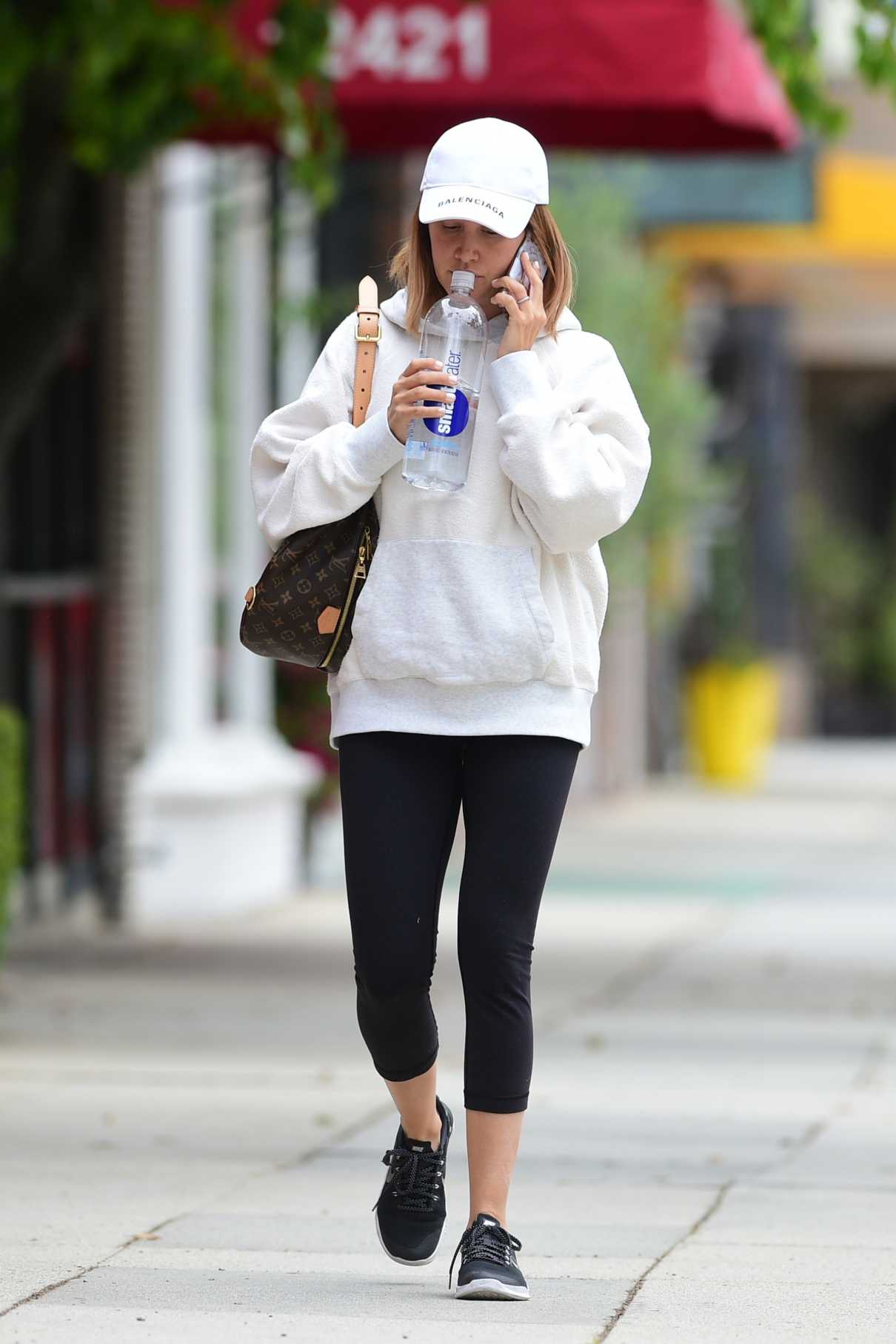 Ashley Tisdale in a White Cap Arrives for a Workout at Training Mate in ...