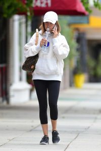 Ashley Tisdale in a White Cap