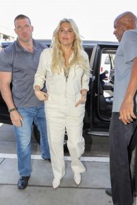 Kesha in a Beige Overalls