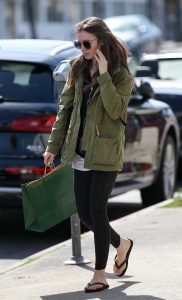 Lily Collins in a Military Green Jacket