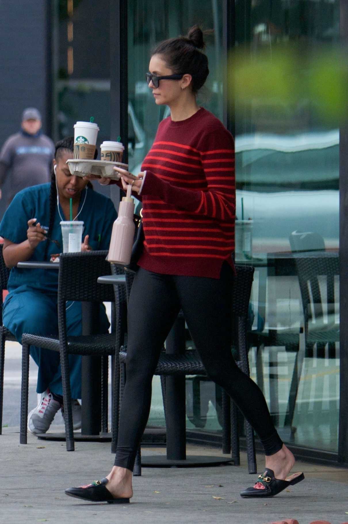 Nina Dobrev in a Black Leggings Leaves a Starbucks in West Hollywood 04 ...