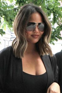 Chrissy Teigen in a Black Cardigan