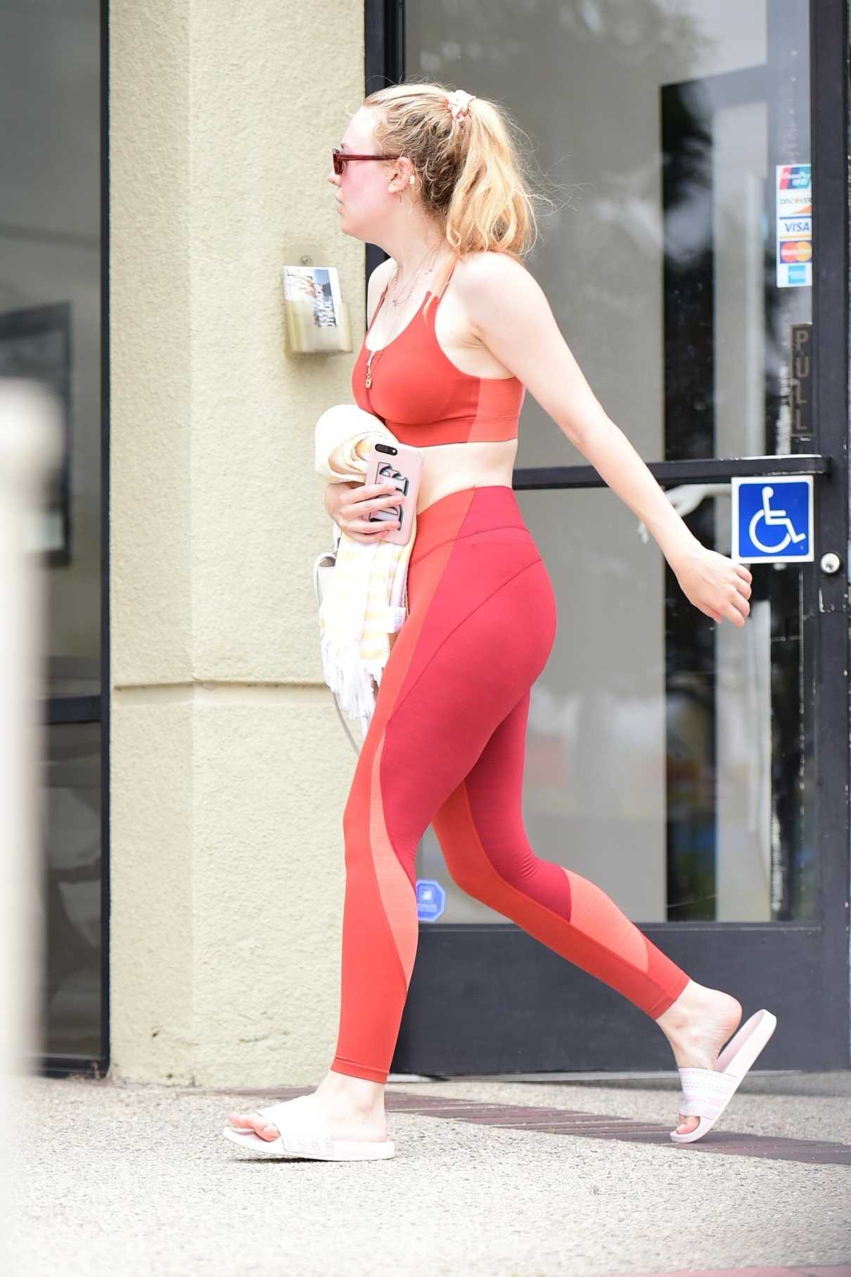 Dakota Fanning in a Red Workout Clothes