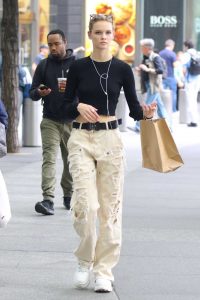 Faith Lynch in a Beige Ripped Pants