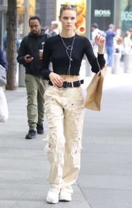 Faith Lynch in a Beige Ripped Pants