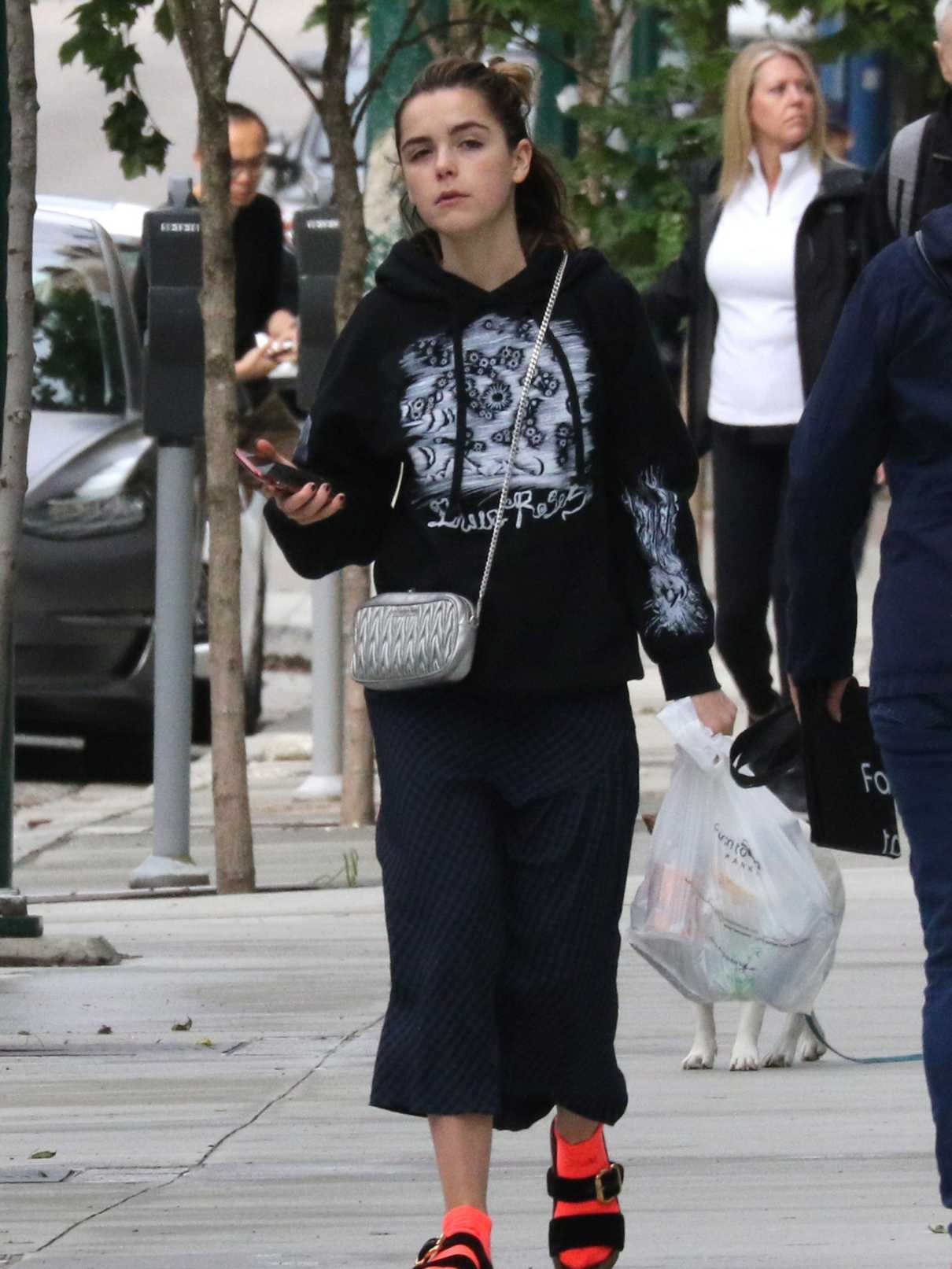 Kiernan Shipka in a Black Hoody